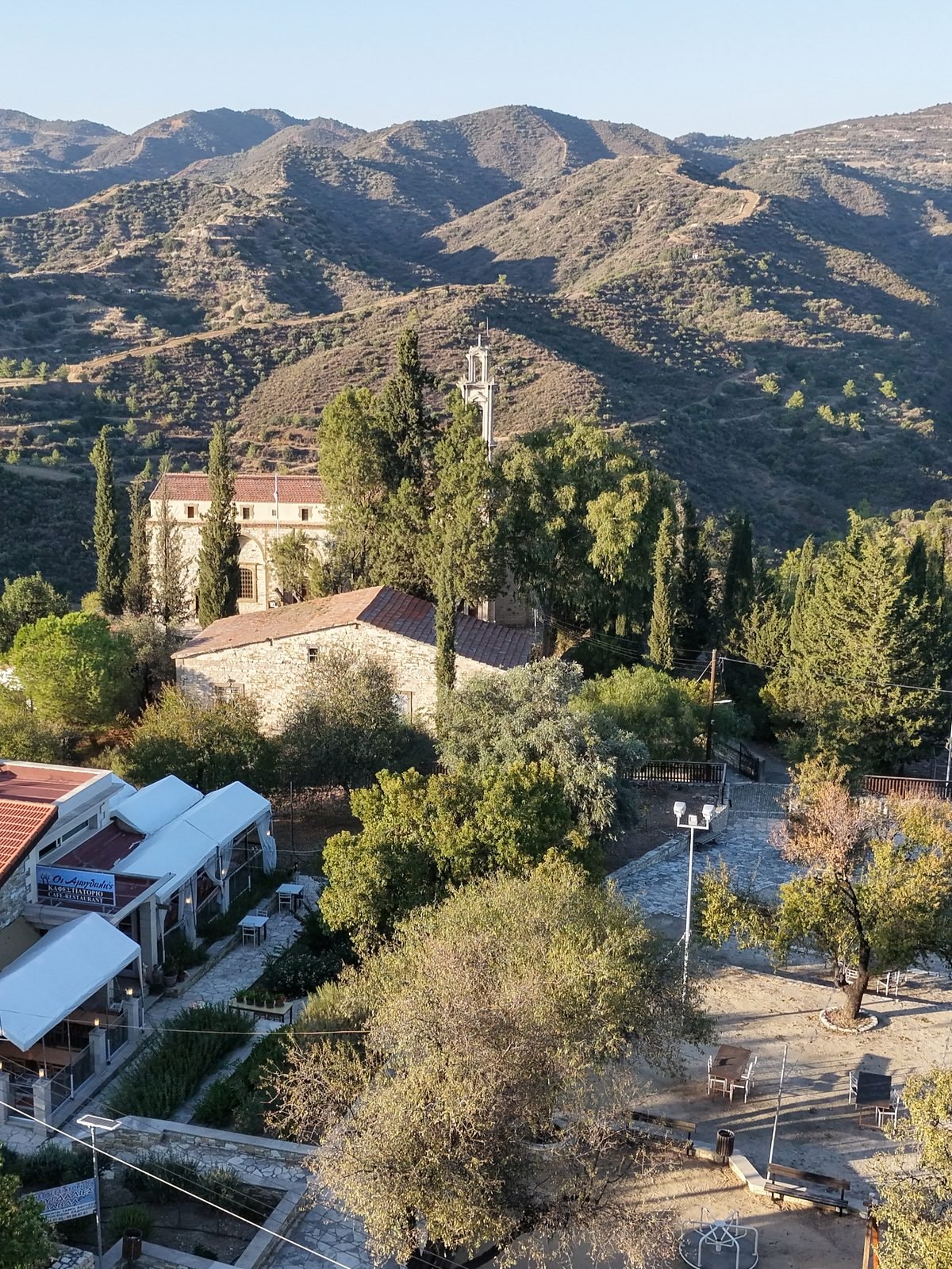 Vavla from the air: the church, the village square and the hills around it